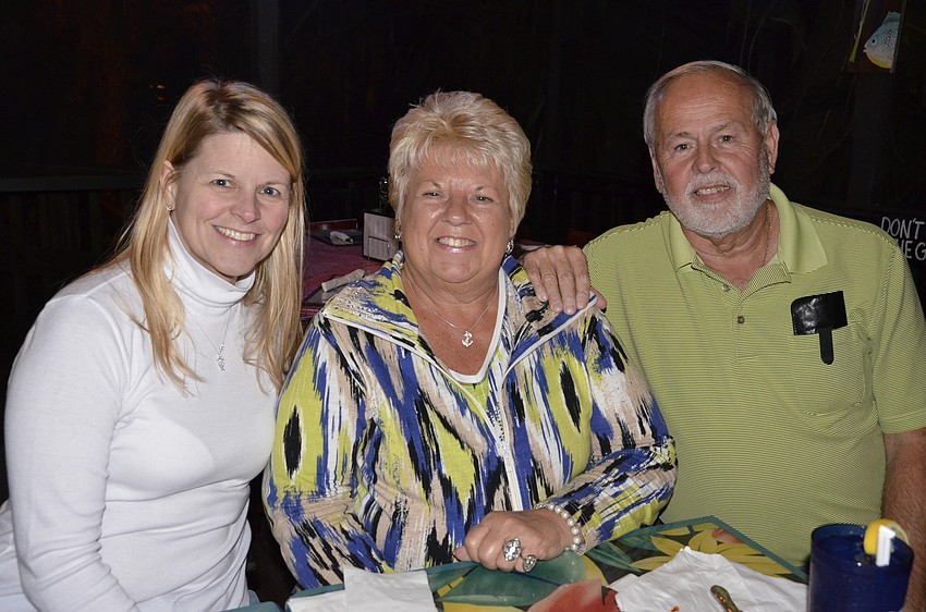 Ruskin seasonal residents Lori Colston, Nancy Shadoan and Gary Buhrow came to Linger Lodge to watch the parade.