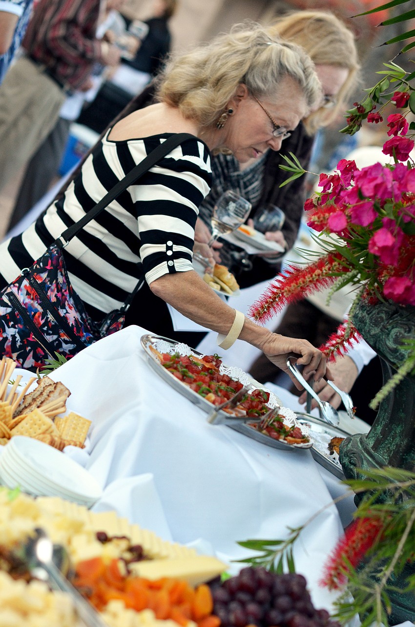 Guests enjoyed a cheese buffet and other hors d’oeuvres before dinner at the Florida Winefest and Auction Banquet on the Block.
