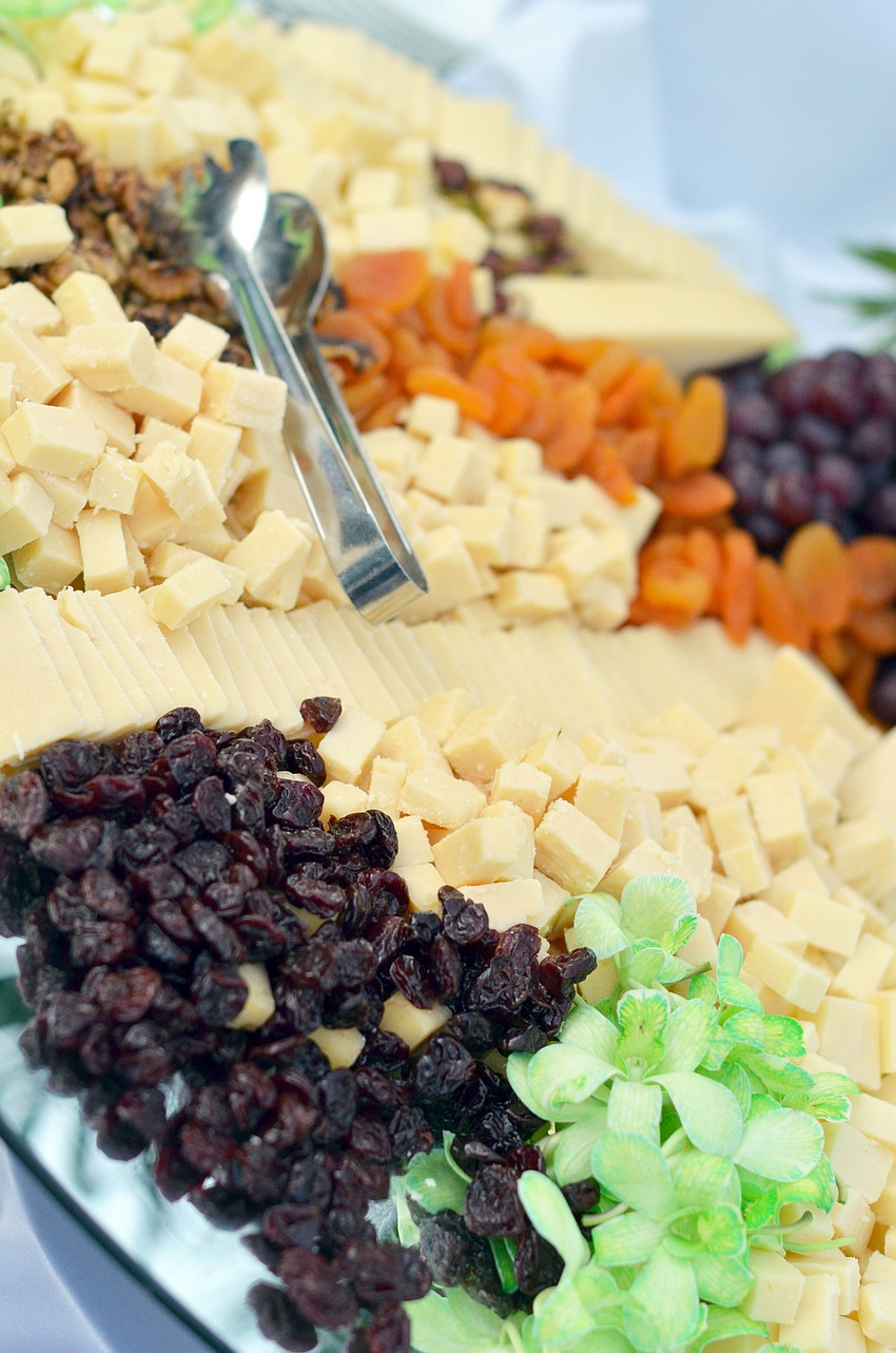 Guests enjoyed a cheese buffet and other hors d’oeuvres before dinner at the Florida Winefest and Auction Banquet on the Block.