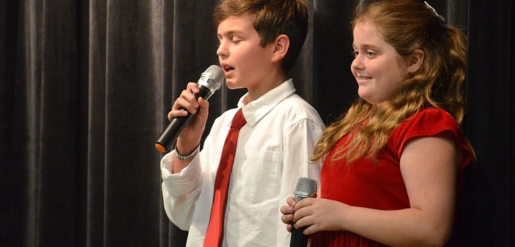 Tye Moore and Tiffany Anderson, of Bradenton, sing, "Do You Want to Build a Snowman?"