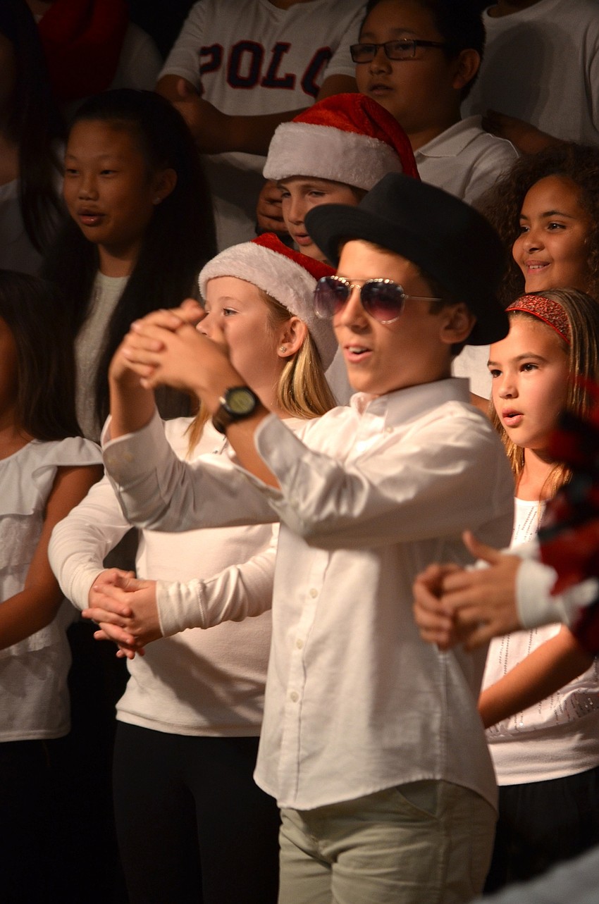 Pavel Kioutchoukov, of Bradenton, sings about Santa Claus.