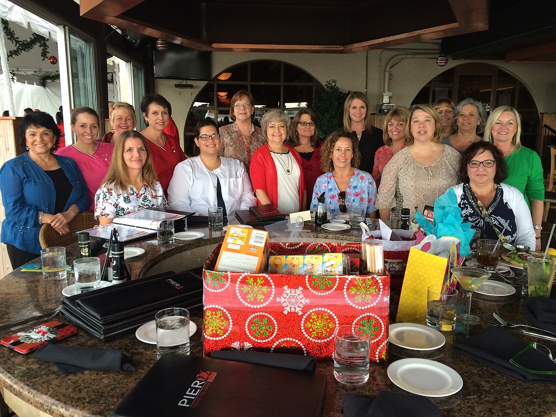 Rather than exchanging gifts, Manatee County schools nurses donated money to send two special needs students to camp.