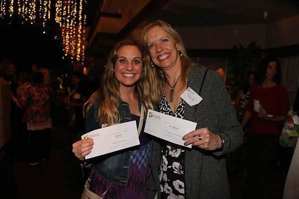 Courtesy photo. Tuttle Elementary teacher, Jaymie Fey and Pine View School teacher, Margaret E. Spies show off their grants after the awards ceremony Wednesday night.