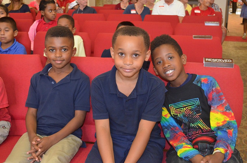 Malik Taylor, 7, Chill Johnson, 7, and Eugene Evans, 7
