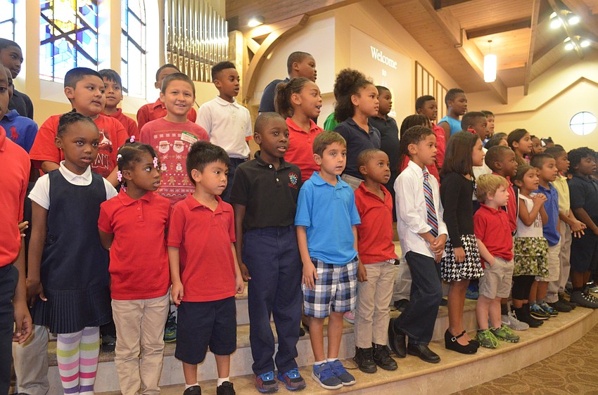 The children sing “Away in a Manger.”