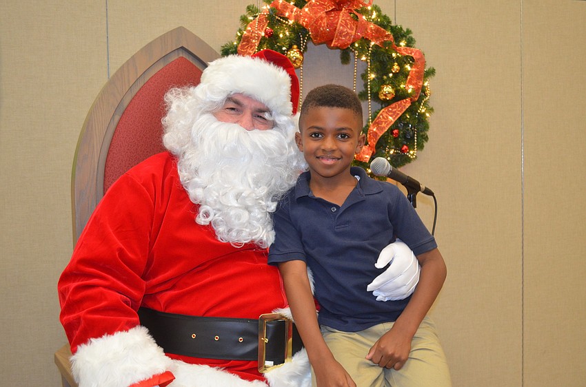 Malik Taylor, 7, with Santa