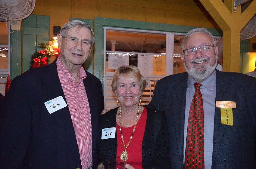 Tom and Sue Reese, of Longboat Island Chapel, and Jack Dean, of G. Fried Flooring America