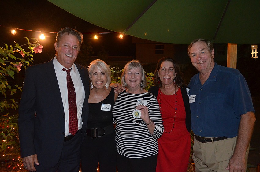 Mike Doll, Jane Hunter, Carol Erker and Nancy and Jack Rozance, of the Rotary Club of Longboat Key