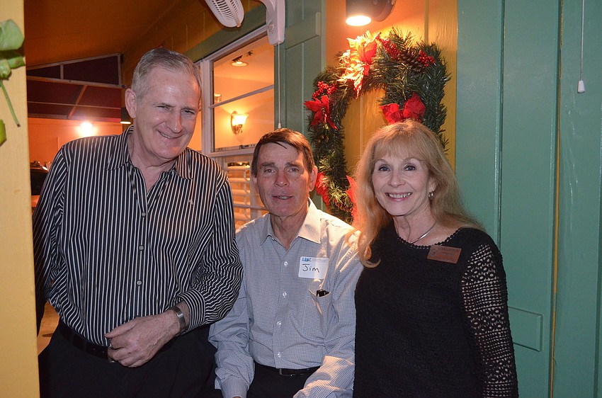 Alan Hazley, of Alan Hazley Financial Agency, and Jim and Commissioner Lynn Larson