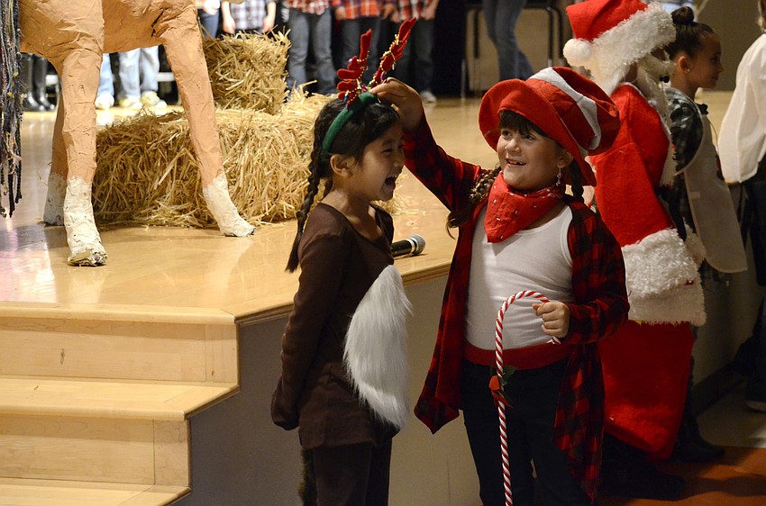 Amelia Villa Mosqueda and Chiara Diaz play Ralph the Reindeer and the Candy Cane Kid.