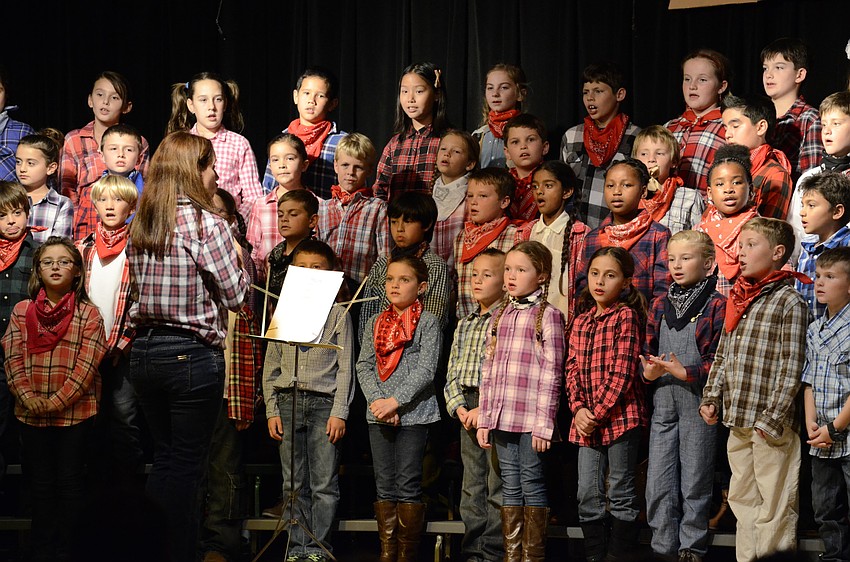 Christy Isaacs directs the choir.
