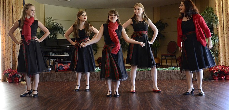 Samantha Crawford, Bea Kelly, Sarah Johnson, Patty McGuire and Emma Diner with Sarasota Sings provided entertainment for the holiday luncheon.