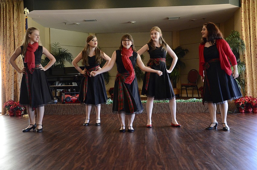Samantha Crawford, Bea Kelly, Sarah Johnson, Patty McGuire and Emma Diner with Sarasota Sings provided entertainment for the holiday luncheon.