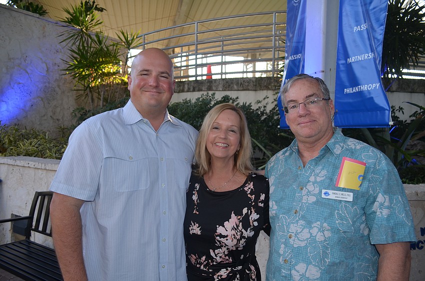 Jason Allen, Mitzi Paskiewicz and Mote Senior Scientist Randall Wells