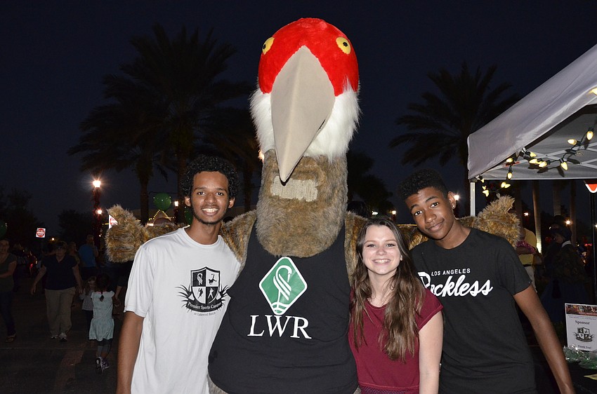 Premier Sports Campus workers Andres Green, Emily Allen and Bryce Nicholas with Cranky