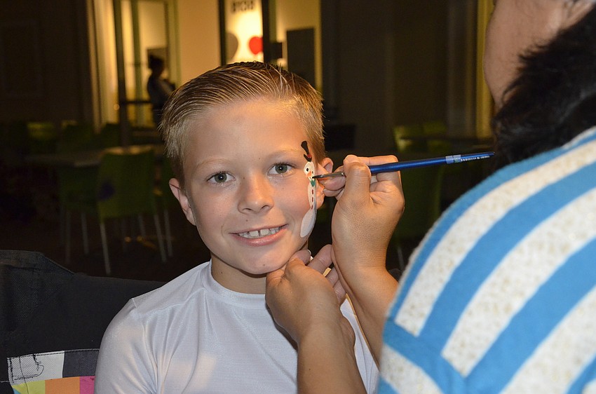 Cody Conway of Lakewood Ranch gets a snowman by Akiko Campell.