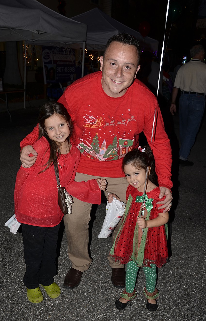 Panther Ridge resident Hector Tobar brought his Ellenton nieces, Sarah and Teegan Monahan, to Holidays around the Ranch.