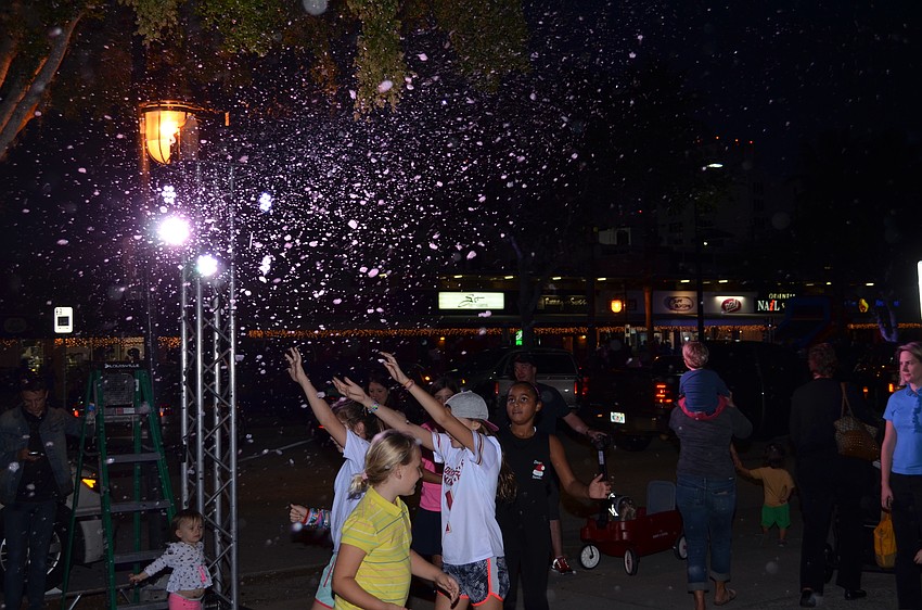 Snow machines throughout the stroll created flurries.