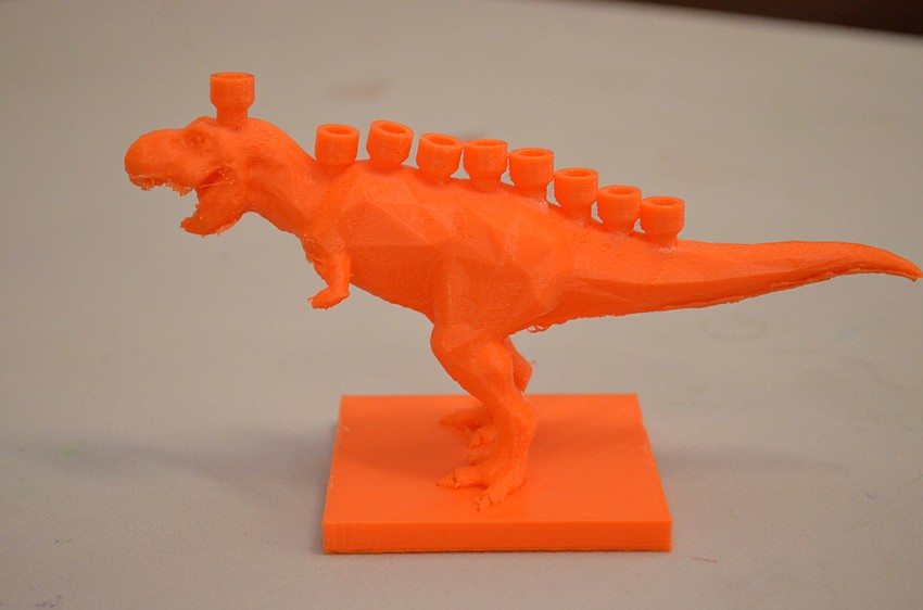 Sam Howard made his Menorahsaurus using a 3D printer.