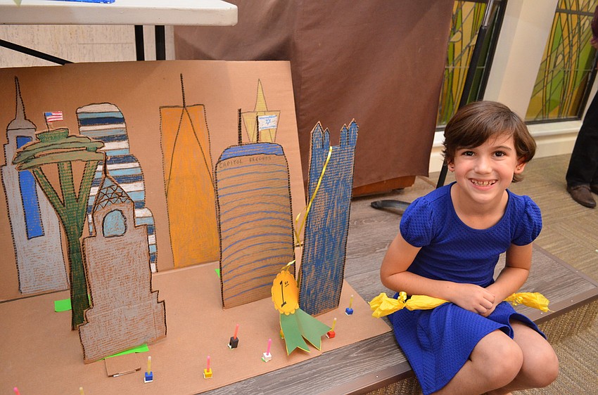 Mia won the menorah-making contest with her 