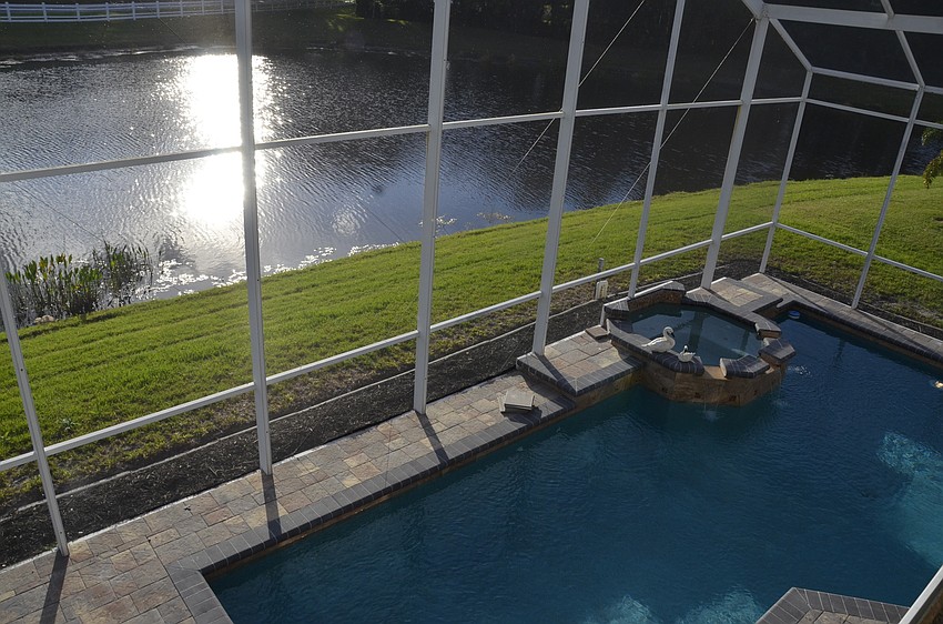 The pool was completely retiled and pavers were added around the deck for a finished look.