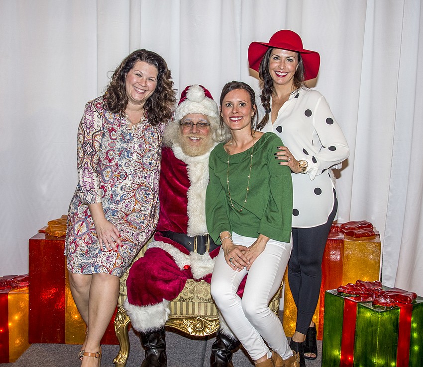 Event Chairs Bianca Lawrence, Shana Zamikoff and Michele Schlossberg with Santa