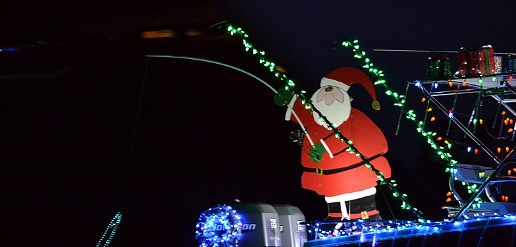 Santa Claus reels in a catch on the back of entry 4.