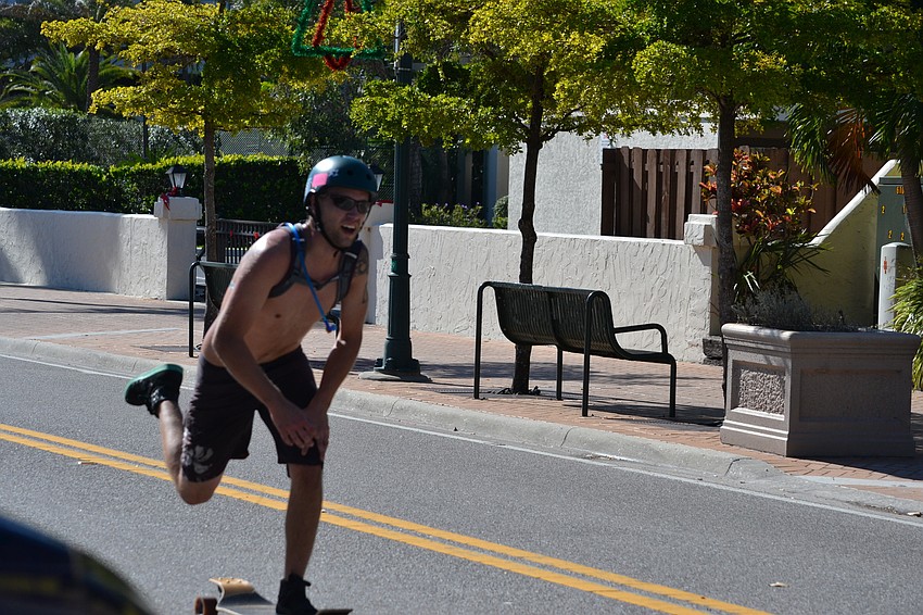 Second place participant Evan Bshures before crossing the finish line.