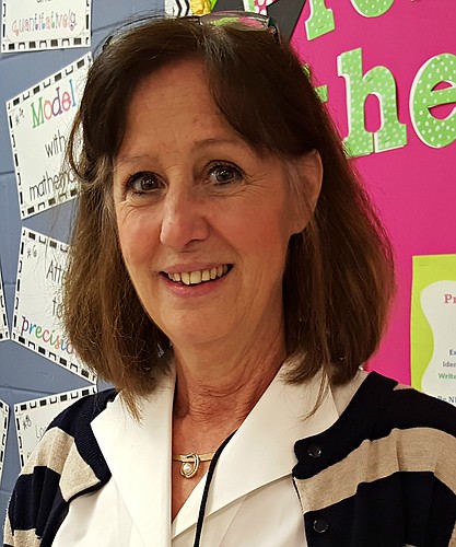 Mary Anne Maginot teaches math at Nolan Middle School.