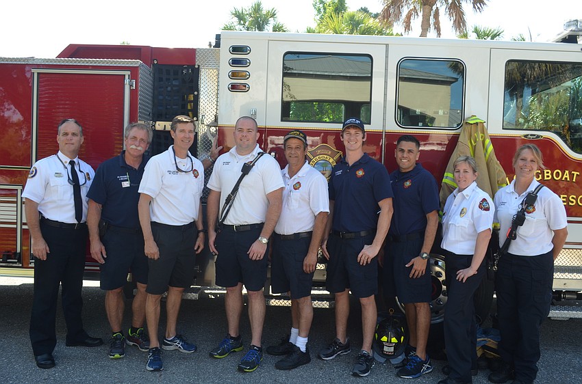 Fire Chief Paul Dezzi with his squad, Jeff Bullock, Mark Fultz, Bryan Carr, Jorge Alvarez, Daniel Heath, Jose Rivera, Sandy Drake and Kerri Brooks
