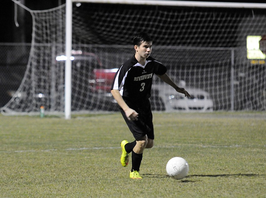 Riverview defender Sean Mixon pushes the ball up the field.