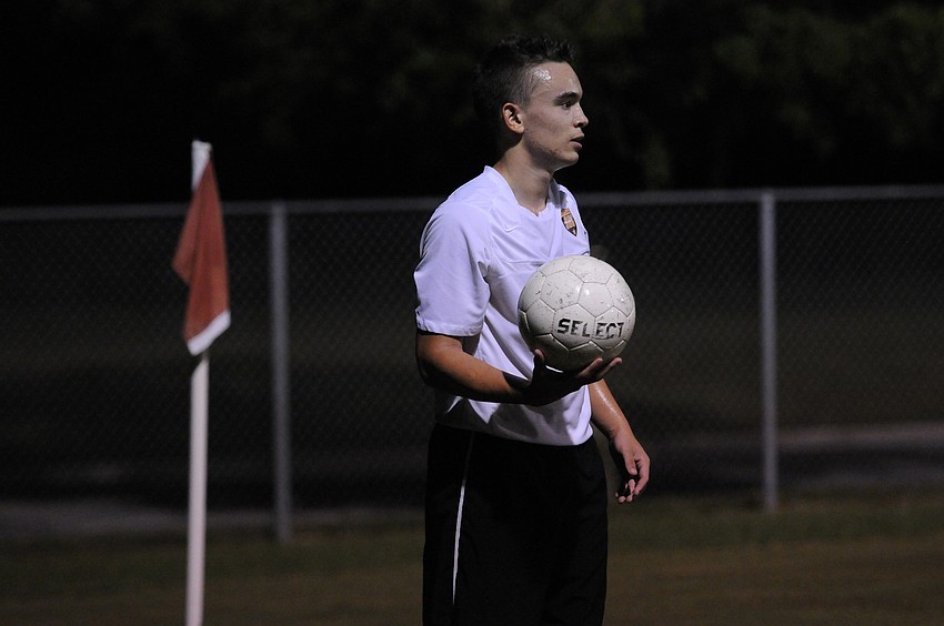 Sarasota senior Anthony Mays prepares to take a throw in for the Sailors.