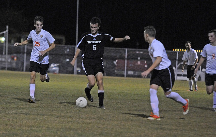 Riverview defender Etienne Behan looks to maintain possession for the Rams.