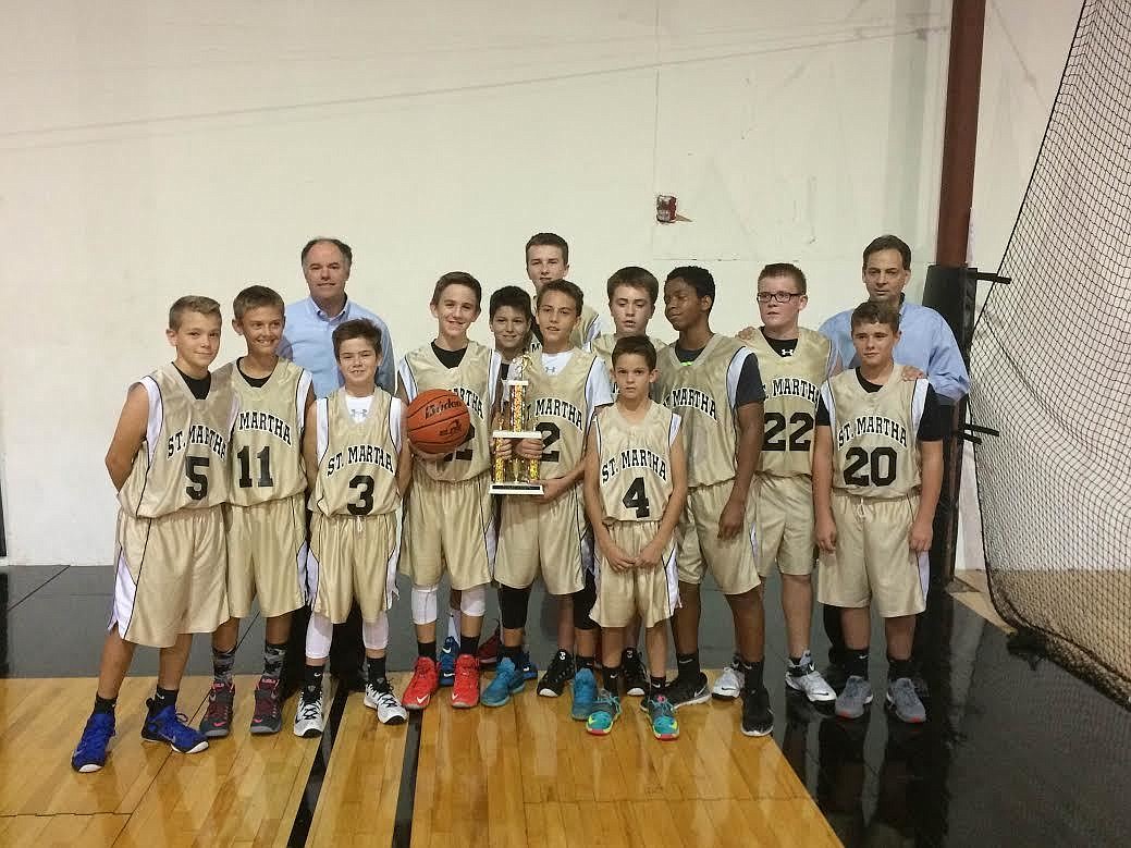 The St. Martha Catholic School boys basketball team won the Florida Gulf Coast League Championship Dec. 10.