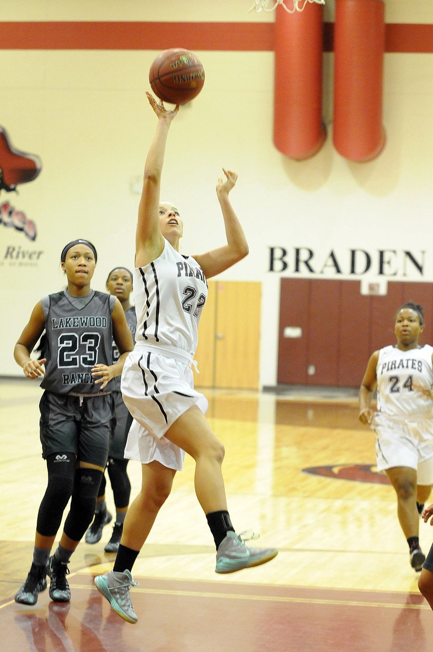 Braden River senior point guard Taylor Ide goes up for a layup in the first quarter.