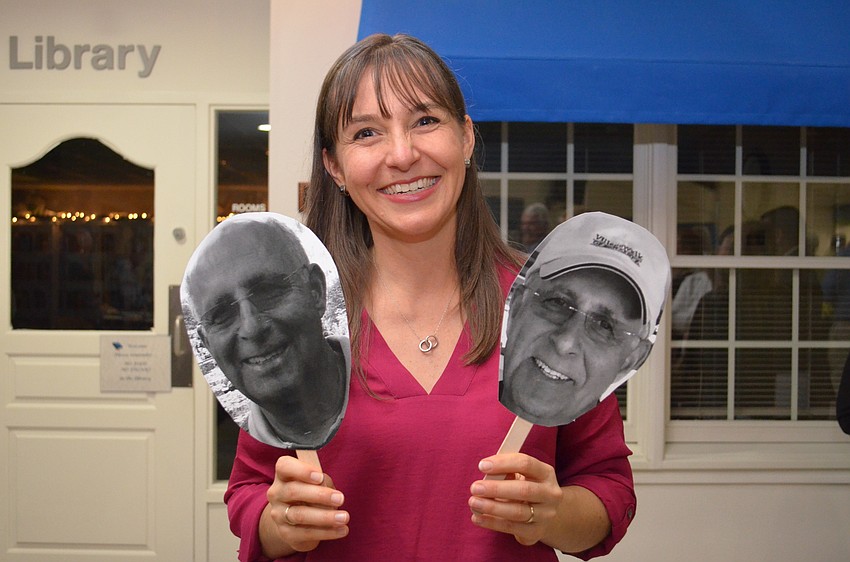 Rebecca Carter with cutouts of her father for the party.