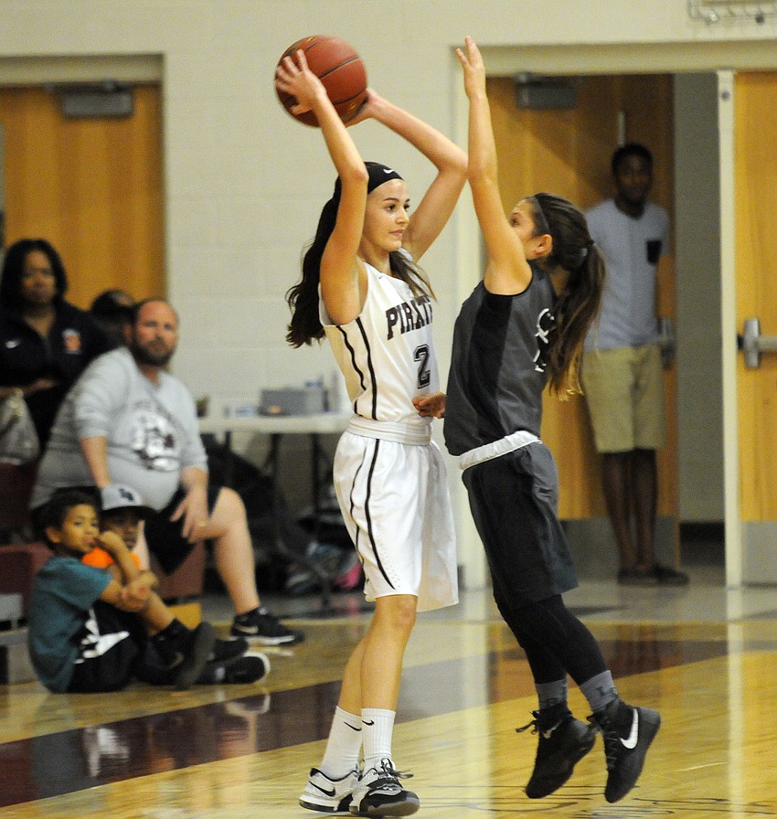 Braden River junior guard Bailee Steury attempts to pass the ball around Lakewood Ranch's Sarah Fazio.