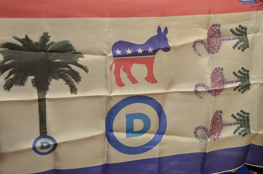Specially made scarves by local artist Pat Kaufman are available to purchase through the Sarasota Democrats Club.