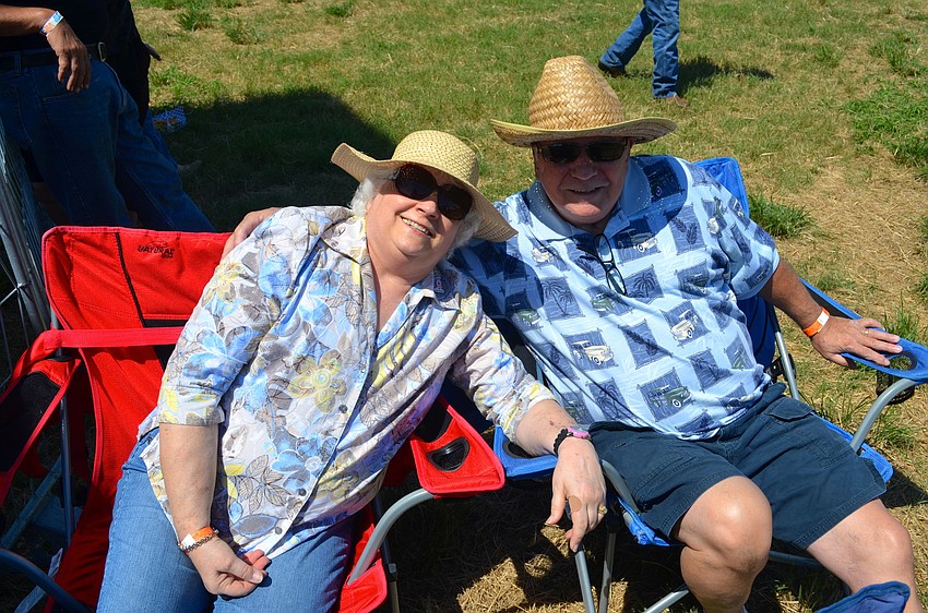 Jan and Dan Taggart find a spot in the shade for the all-day event.