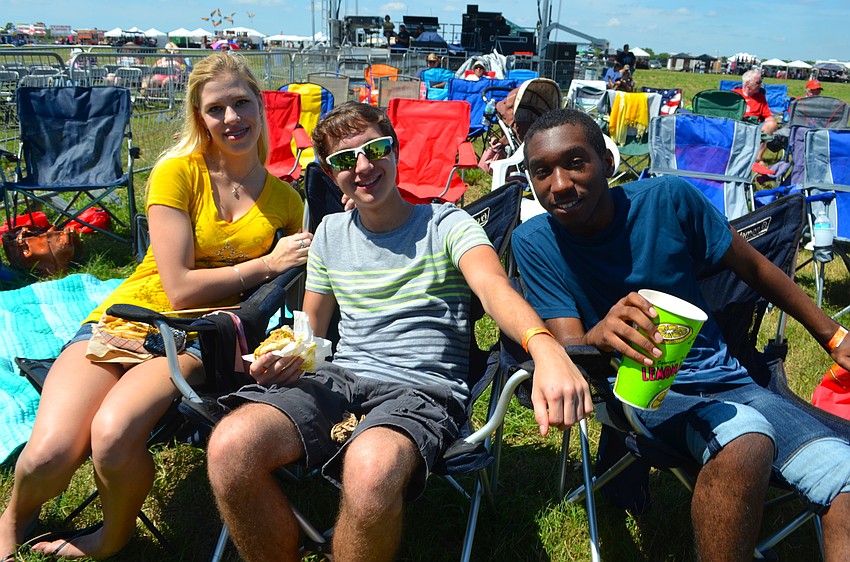 Friends Reilly Thompson, Blake Martino and Paris Carey support the local and nationally recognized bands that performed.