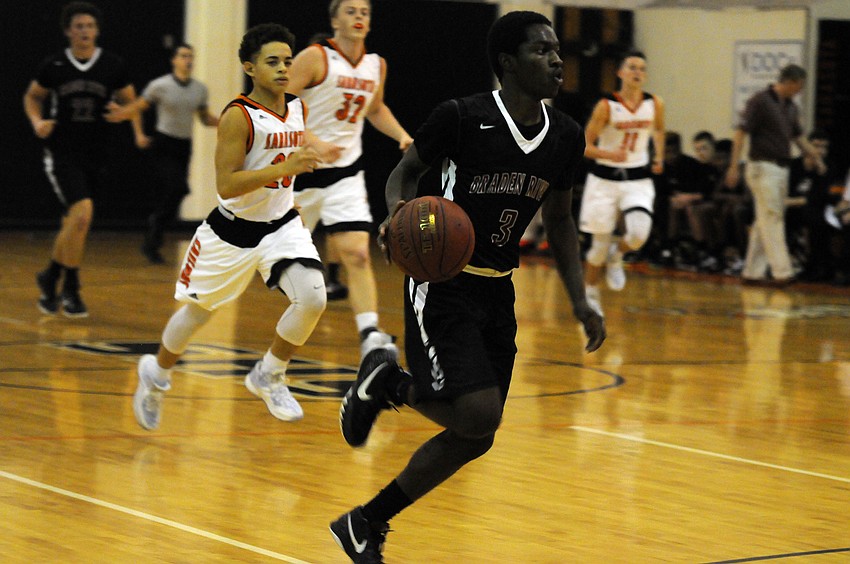Braden River's Deoni Cason drives to the hoop on a fast break.