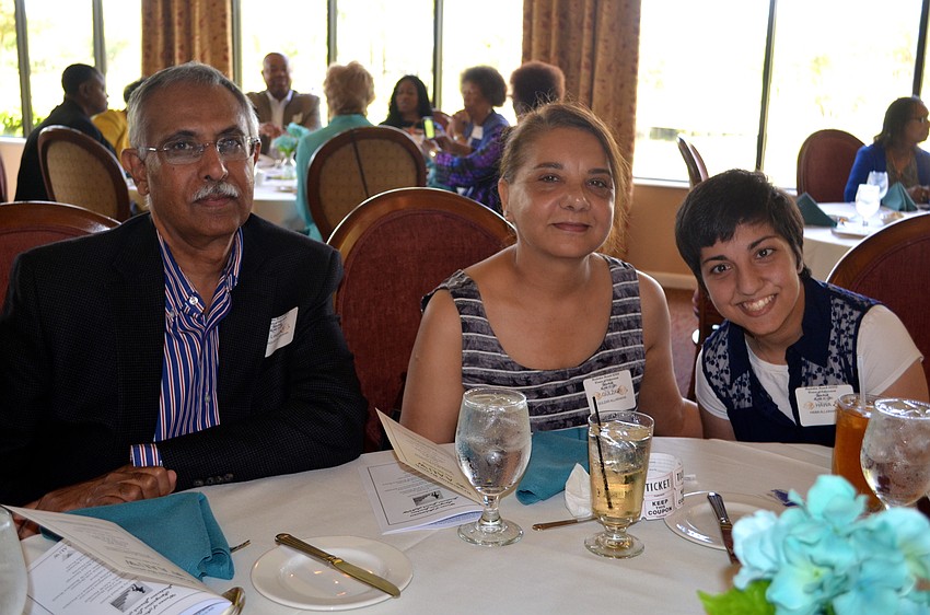 Dr. Allarakhia and his wife, Gulzar, and daughter, Hana, support Dr. Anila Jain and the other honorees.