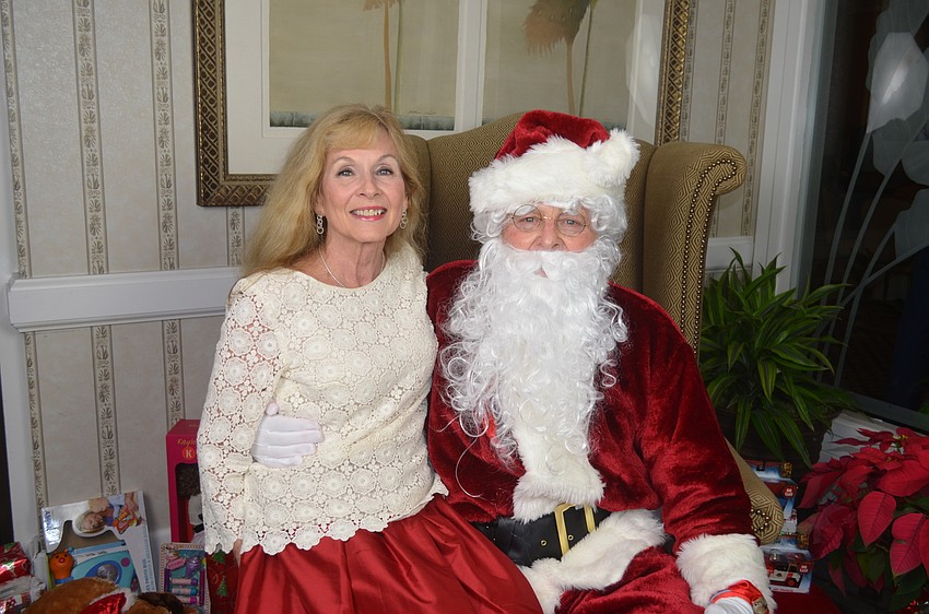 Commissioner Lynn Larson and Frank Cona as Santa