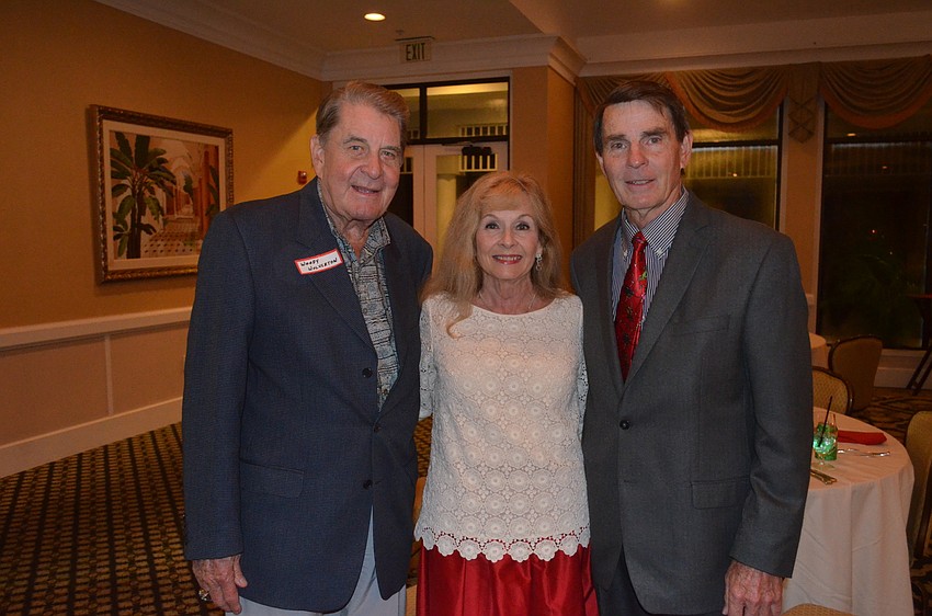 Woody Wolverton and Commissioner Lynn and Jim Larson