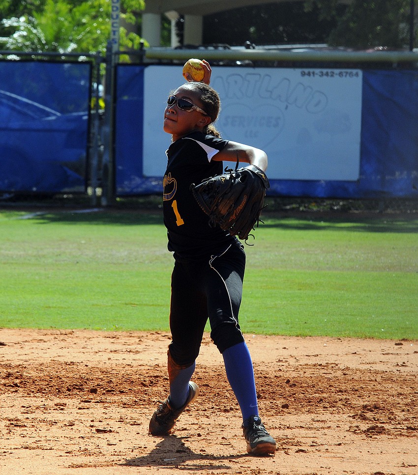 Sarasota Christian shortstop McKenzie Clark throws a ground ball back to first base.