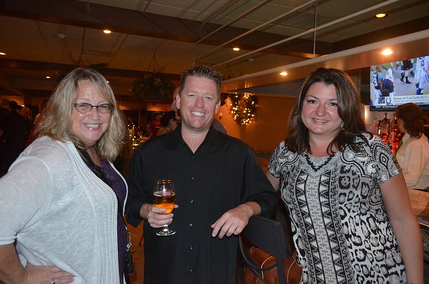 Theresa Morton, of the Spice & Tea Exchange, Jason Burns, of Lynches Pub & Grub, and Paulette Callender, of the Spice & Tea Exchange