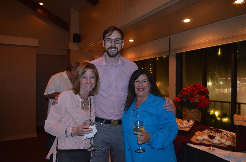 Kimi Newcomb, Chris Hope and Yvonne Schloss, of Sunglasses Express Optical