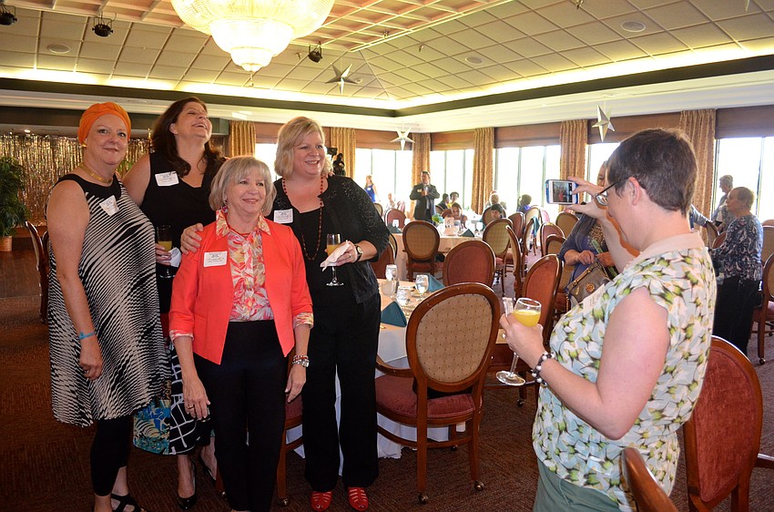 Amanda Horne snaps a photo of her friends to commemorate the event.