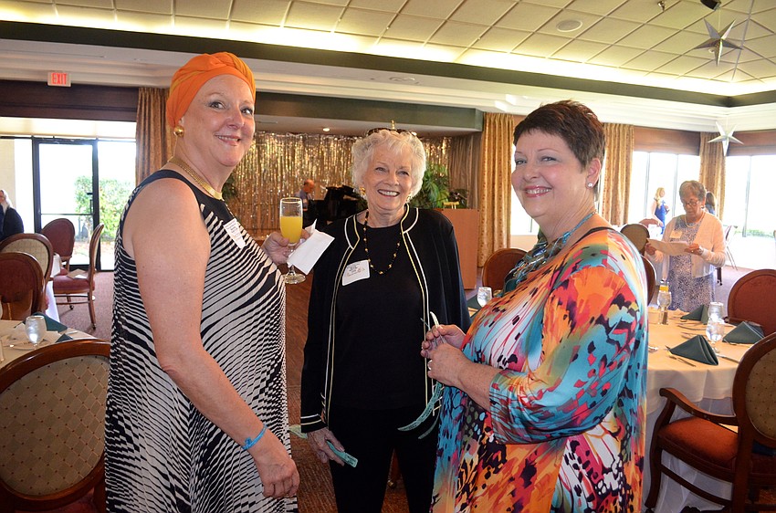 Victoria Horstmann, Jan Entwistle and Mary Ann Armes have friends who received recognition at the luncheon.