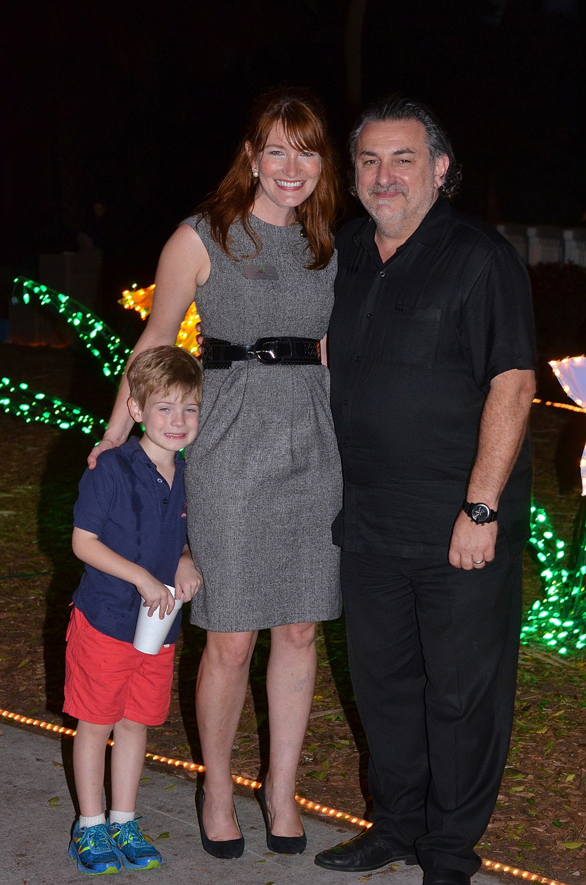 Emily Walsh with her son Rhys and Phil Mancini